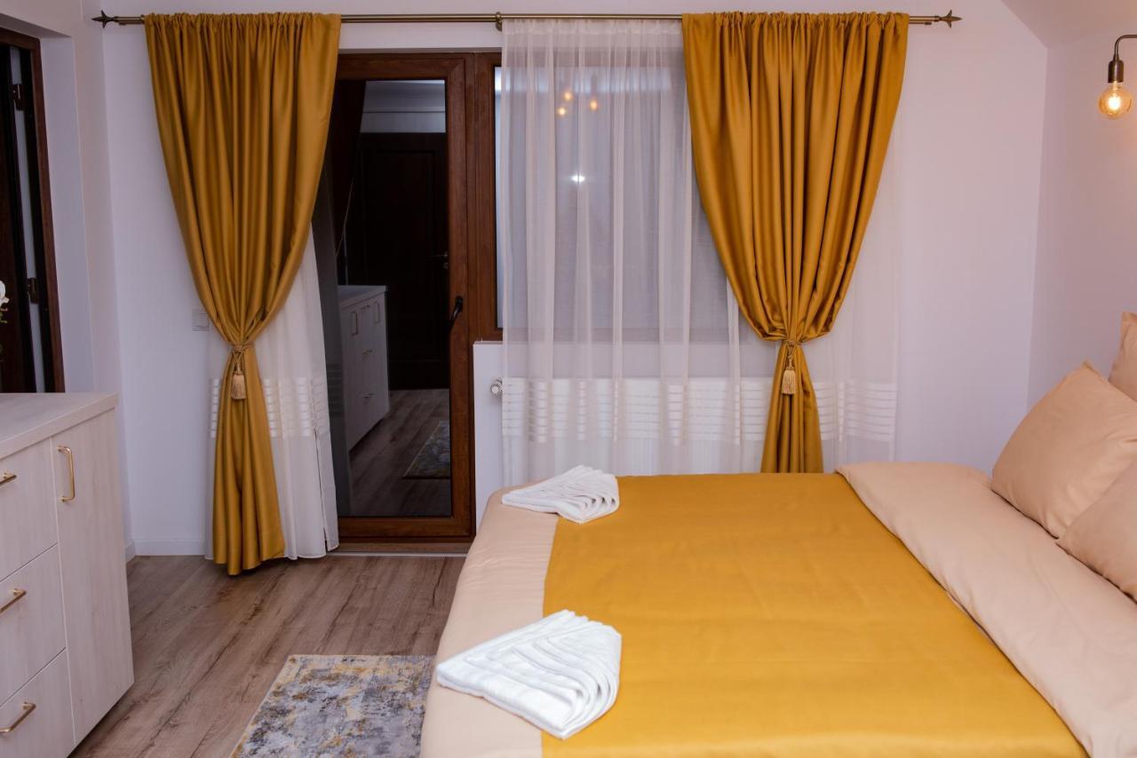 Casuta Doi Ponei Buşteni Exterior foto